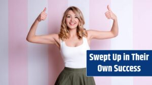 Happy emotional woman posing and showing thumbs up on pink background.Young blonde woman giving thumbs up, approving doing positive gesture with hand for success.