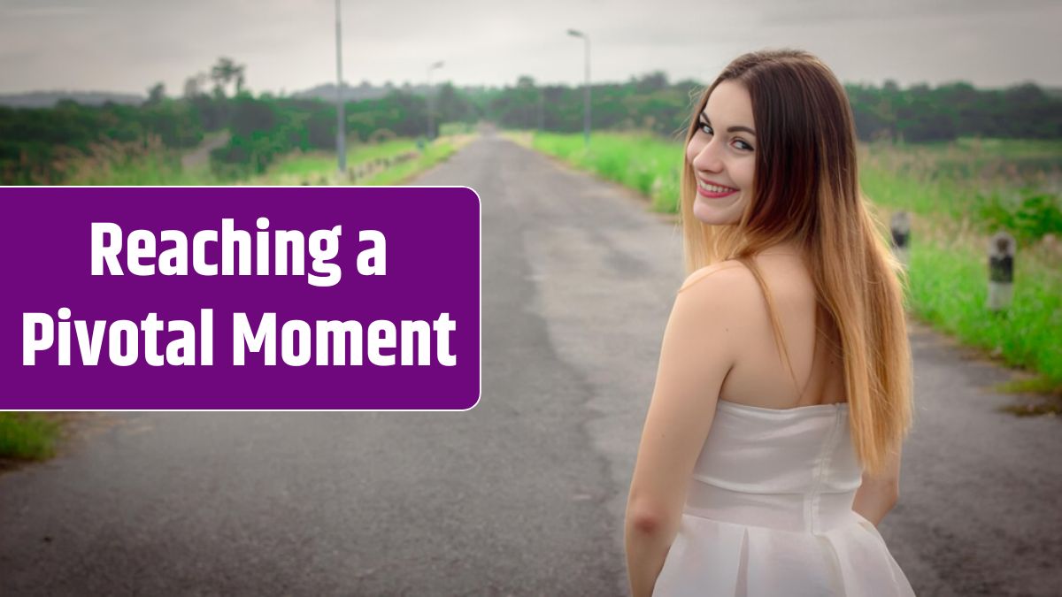 Portrait of smiling young woman standing on road.