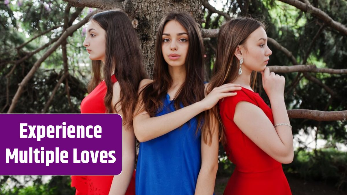 Three teenagers girl in blue and red dresses posed outdoor.