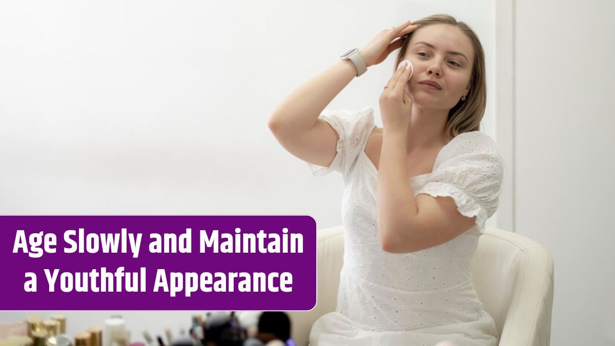 Pretty young woman doing everyday routine removing her makeup with a cotton pad.