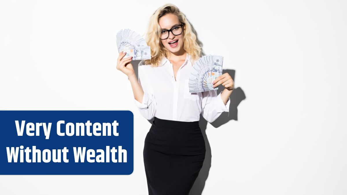 Portrait of a businesswoman in suit holding bunch of money banknotes and celebrating isolated over white wall.